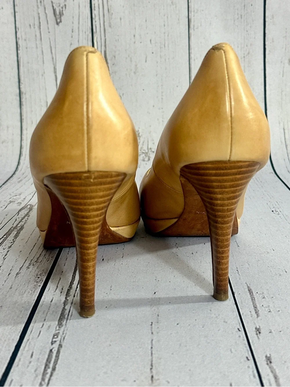 Cole Haan Chelsea pumps featuring a stacked heel and tan leather women’s size 9B